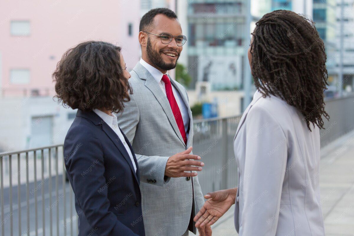 Darnell Brooks talking with two constituents on a Staten Island sidewalk