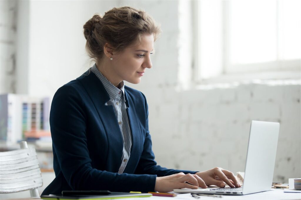 Designer working on brand concepts at an agency desk
