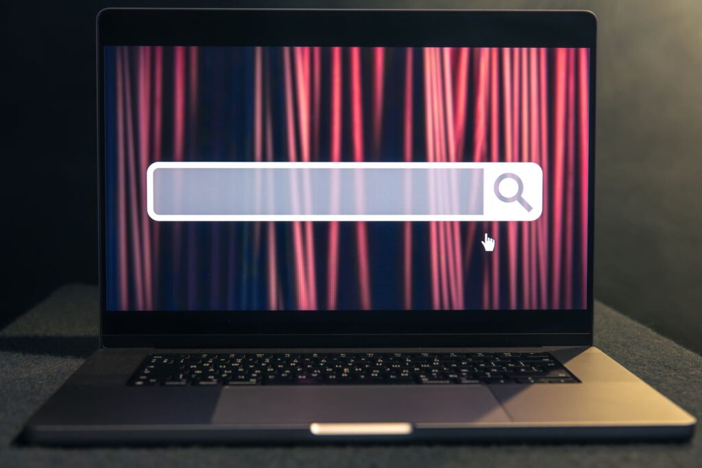Laptop screen showing a search engine bar